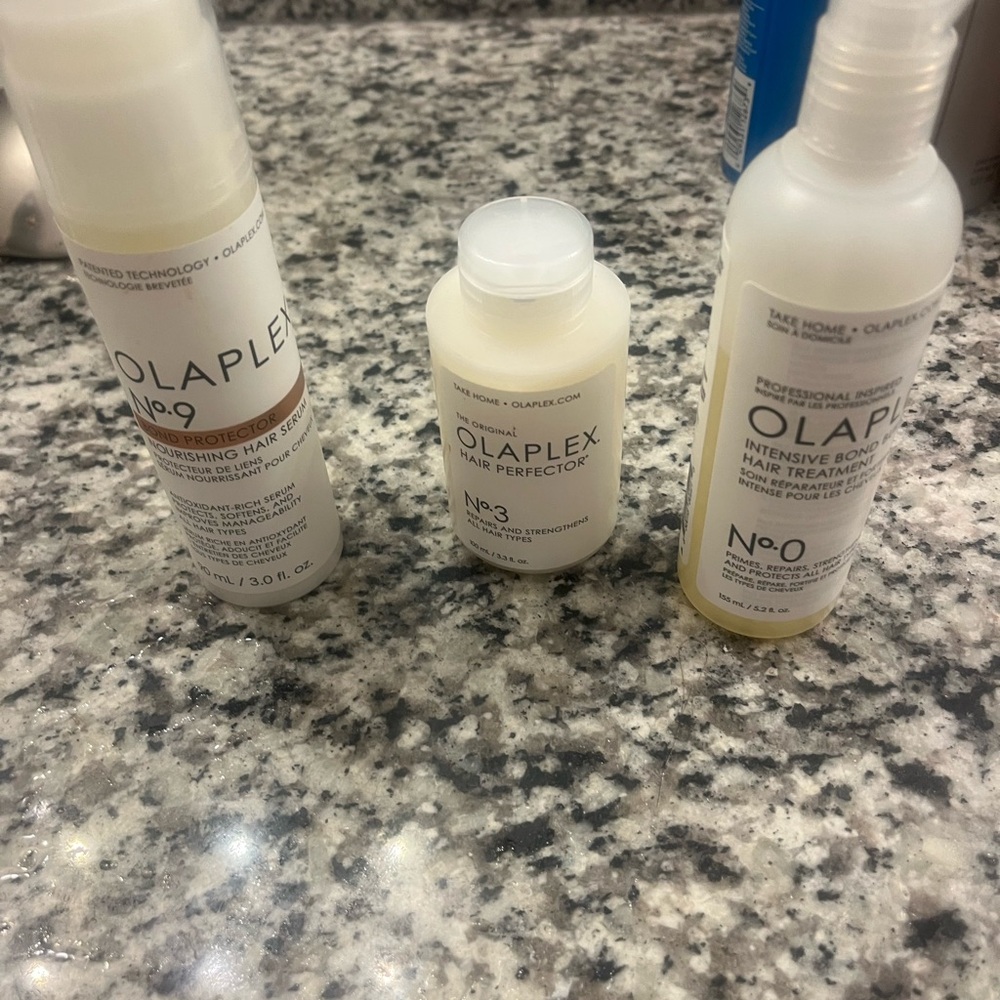 OLAPLEX Repair Trio in White and Cream Bottles
